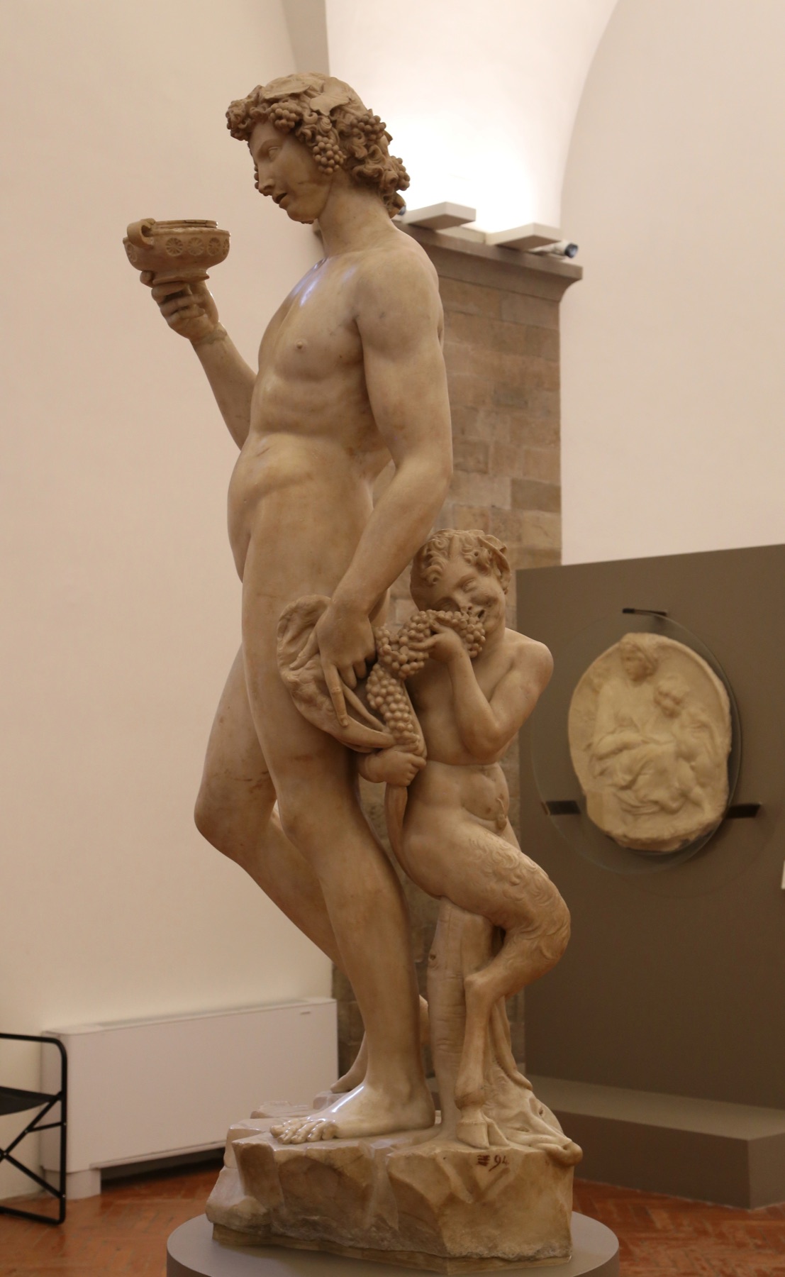 Annotated details from Bacchus by Michelangelo